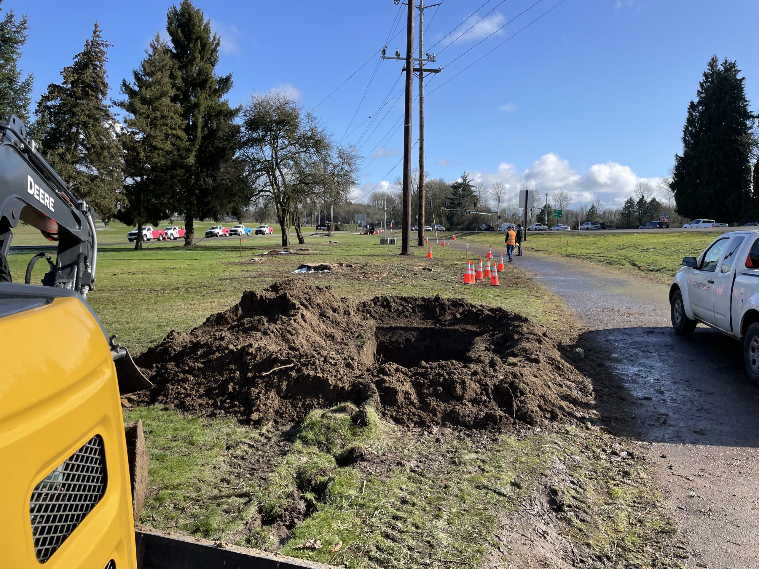 A hole dug in grass.