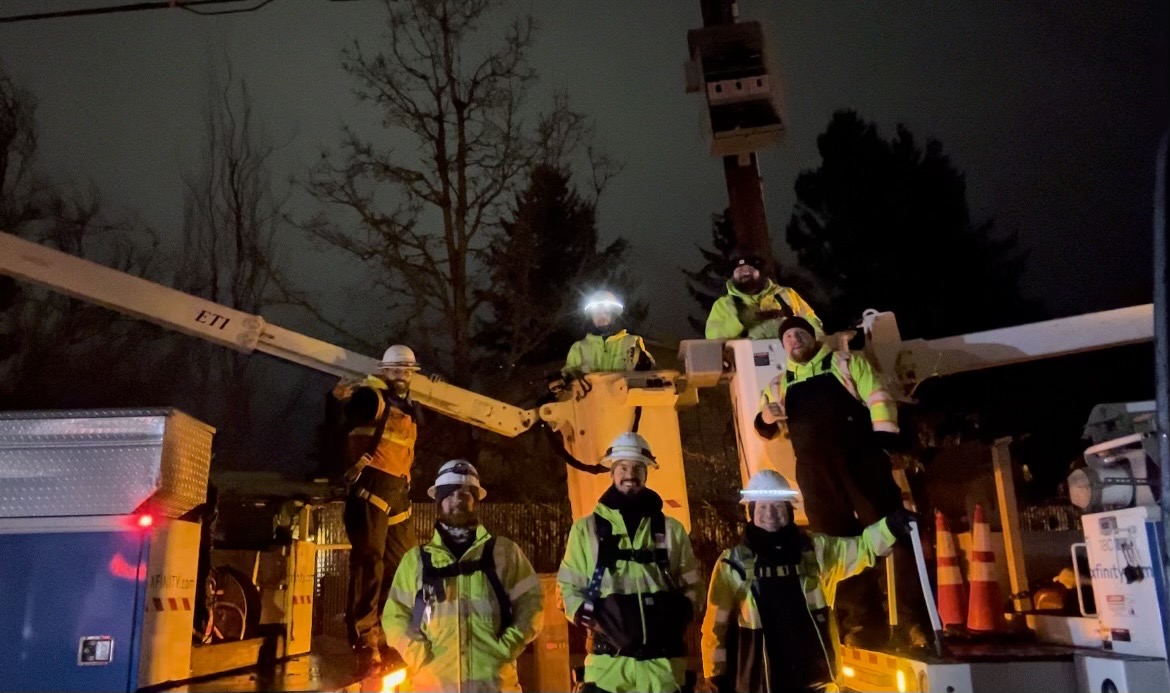 Comcast technicians working to restore service.