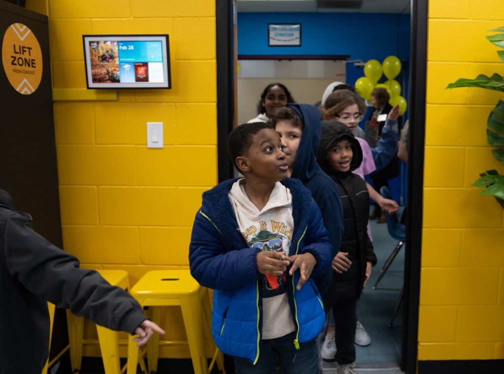 Students walk into a Lift Zone Lab.